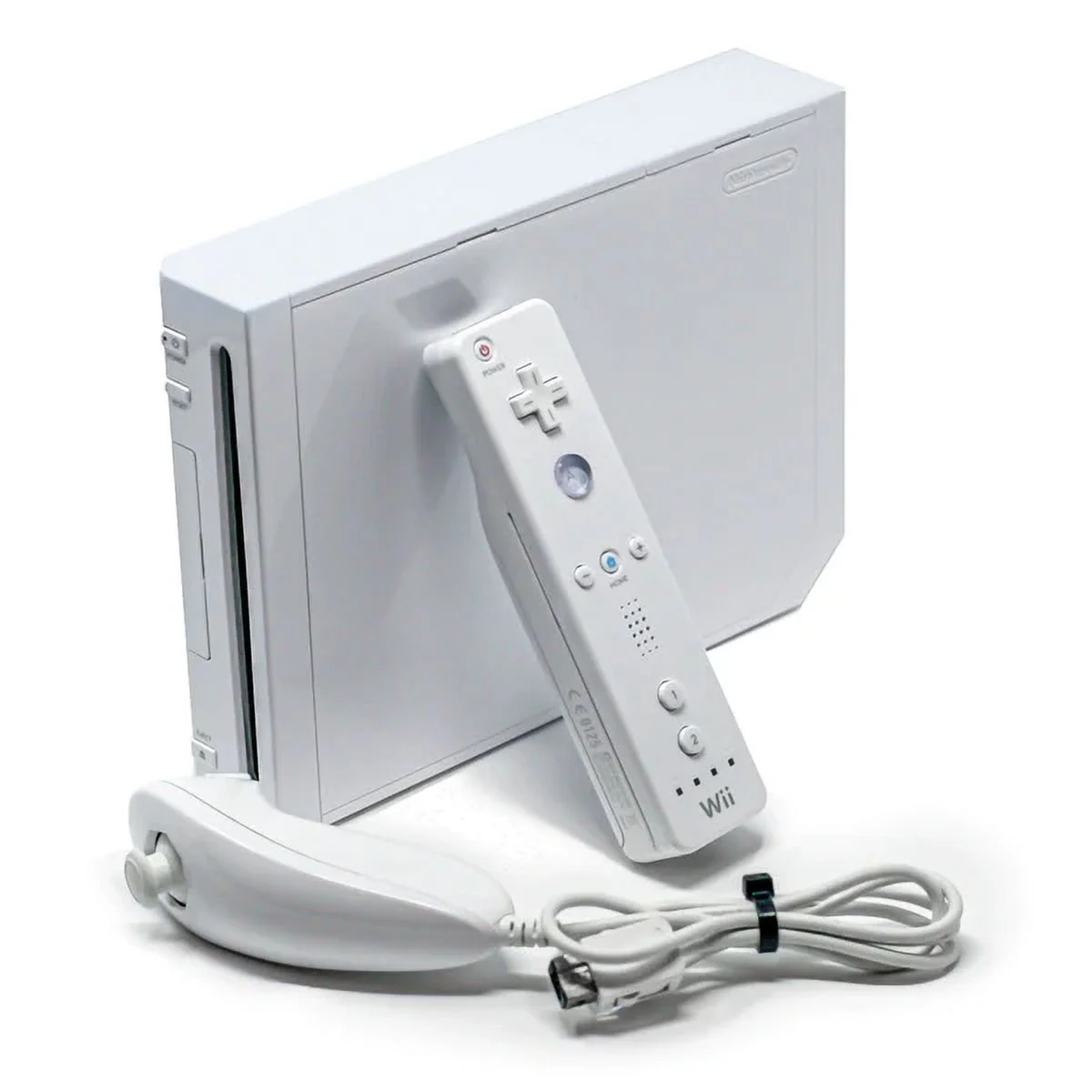 Image is of the Wii console with the Wii remote leaning on it and the Nunchuck.