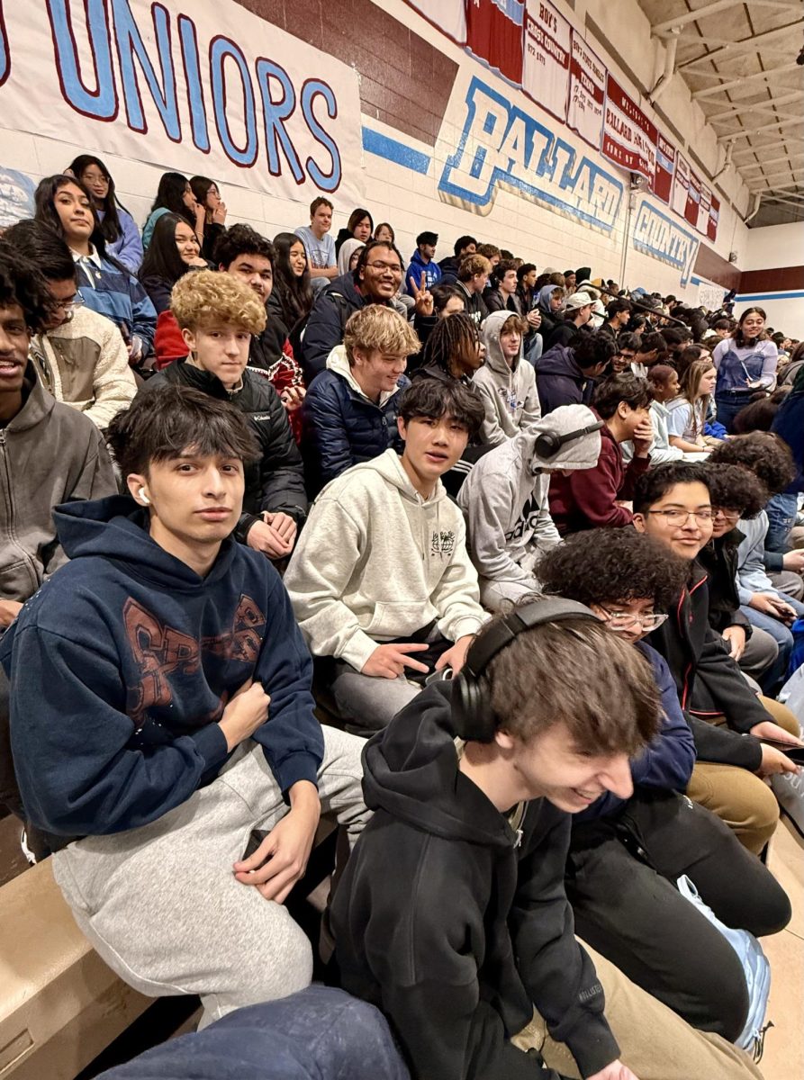 The juniors sitting down during the pep rally.