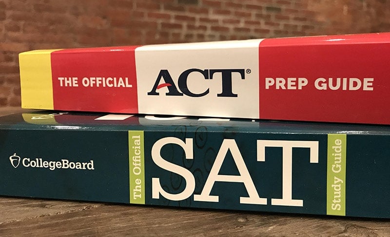 a photo of two text books, one about the ACT and the other about the SAT.